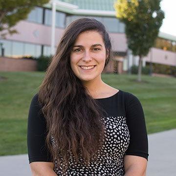 A headshot of Sarah DelSanto standing on campus